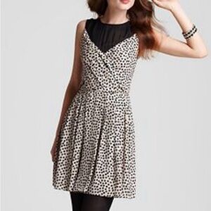 BCBGeneration spotted print and mesh sleeveless mini dress.